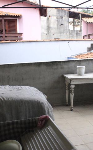 Casa à venda com 215m², 4 quartos e 3 vagasVaranda e lavanderia 1