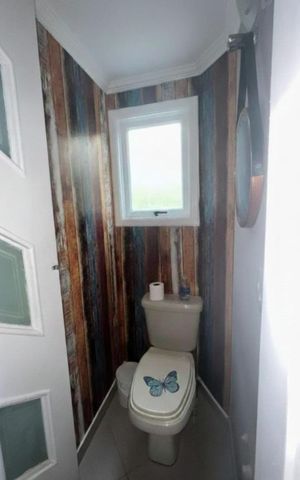 Casa à venda com 250m², 3 quartos e 3 vagasBanheiro