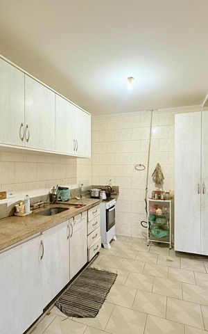 Casa à venda com 115m², 3 quartos e 2 vagas Casa à venda com 115m², 3 quartos e 2 vagasCozinha