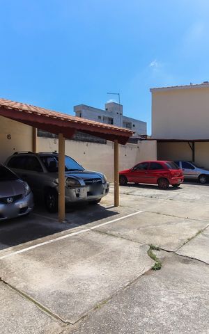 Casa de condomínio à venda com 62m², 2 quartos e 1 vaga Casa de condomínio à venda com 62m², 2 quartos e 1 vagaEstacionamento
