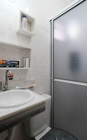 Casa de condomínio à venda com 65m², 2 quartos e 1 vagaSuíte 1