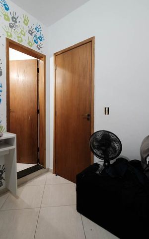 Casa de condomínio à venda com 65m², 2 quartos e 1 vagaSuíte 1