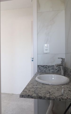 Apartamento à venda com 66m², 2 quartos e 2 vagasBanheiro Quarto 1 suíte
