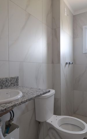 Apartamento à venda com 66m², 2 quartos e 2 vagasBanheiro Quarto 1 suíte