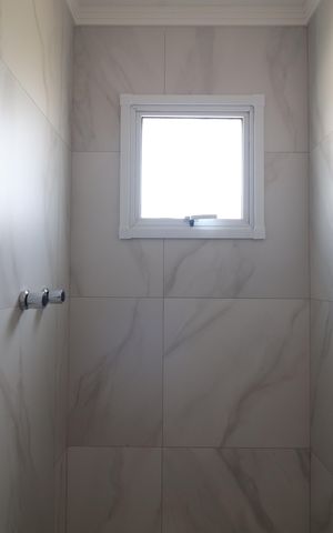 Apartamento à venda com 66m², 2 quartos e 2 vagasBanheiro Quarto 1 suíte