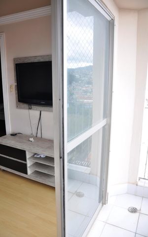 Apartamento à venda com 56m², 2 quartos e 1 vaga Apartamento à venda com 56m², 2 quartos e 1 vagaDetalhe - Varanda da Sala e Sala de Jantar