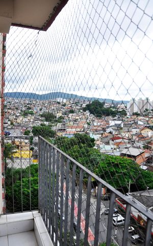 Apartamento à venda com 56m², 2 quartos e 1 vaga Apartamento à venda com 56m², 2 quartos e 1 vagaDetalhe - Varanda da Sala e Sala de Jantar