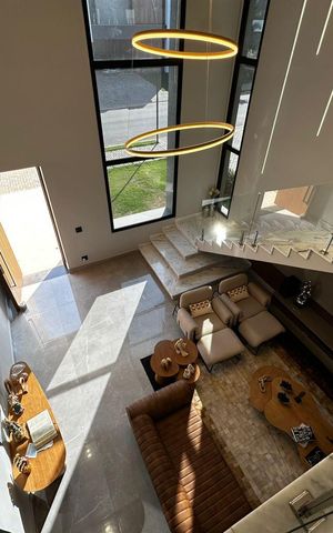Casa de condomínio para alugar com 420m², 3 quartos e 4 vagasSala
