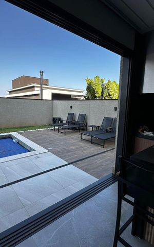Casa de condomínio para alugar com 420m², 3 quartos e 4 vagasÁrea externa