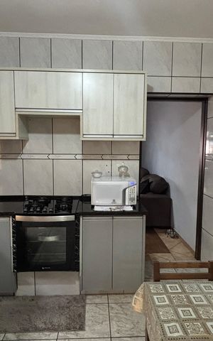 Casa à venda com 106m², 3 quartos e 1 vaga Casa à venda com 106m², 3 quartos e 1 vagaCozinha