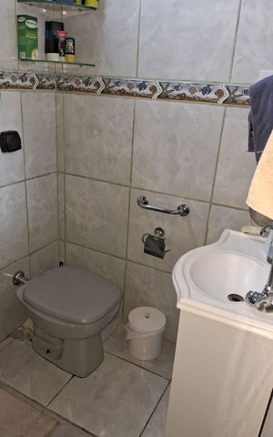 Casa à venda com 125m², 3 quartos e 2 vagasBanheiro