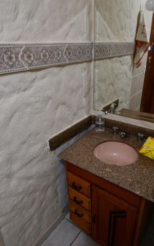 Casa à venda com 250m², 4 quartos e 4 vagasBanheiro Suíte
