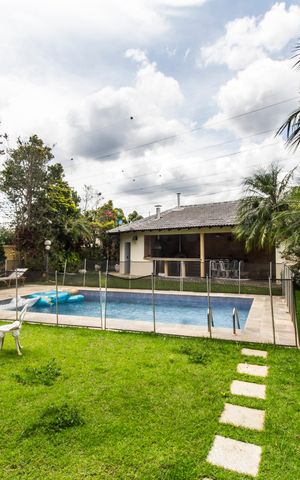 Casa de condomínio à venda com 521m², 4 quartos e 3 vagas Casa de condomínio à venda com 521m², 4 quartos e 3 vagasVista da Sala