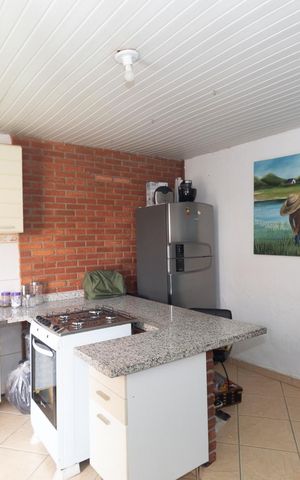 Casa à venda com 180m², 4 quartos e 2 vagas Casa à venda com 180m², 4 quartos e 2 vagasCozinha