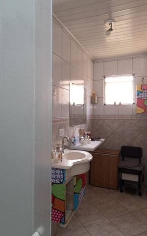 Casa à venda com 180m², 4 quartos e 2 vagas Casa à venda com 180m², 4 quartos e 2 vagasBanheiro casa 2