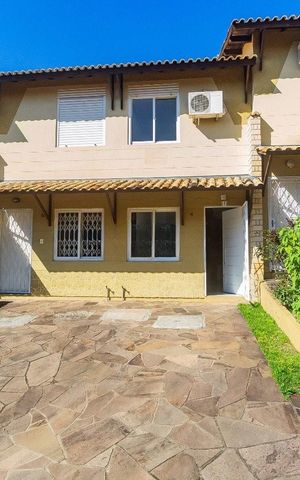 Casa de condomínio à venda com 98m², 2 quartos e 1 vaga Casa de condomínio à venda com 98m², 2 quartos e 1 vagaFachada