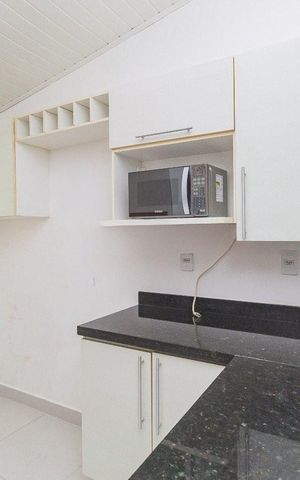 Casa de condomínio à venda com 98m², 2 quartos e 1 vaga Casa de condomínio à venda com 98m², 2 quartos e 1 vagaCozinha