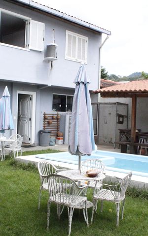 Casa de condomínio à venda com 600m², 6 quartos e 2 vagasÁrea externa