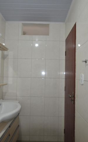 Casa de condomínio para alugar com 140m², 3 quartos e sem vagaBanheiro da Suíte
