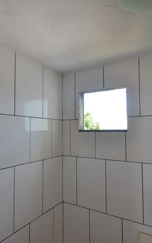 Casa de condomínio para alugar com 140m², 3 quartos e sem vagaBanheiro do Terraço
