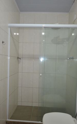 Casa de condomínio para alugar com 140m², 3 quartos e sem vagaBanheiro da Suíte