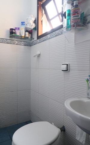 Casa à venda com 60m², 2 quartos e 2 vagasBanheiro 1