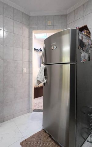 Casa de condomínio à venda com 83m², 2 quartos e 2 vagasCozinha e Área de Serviço