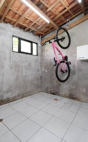 Casa de condomínio à venda com 83m², 2 quartos e 2 vagasCozinha e Área de Serviço