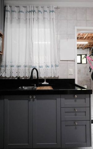 Casa de condomínio à venda com 83m², 2 quartos e 2 vagasCozinha e Área de Serviço