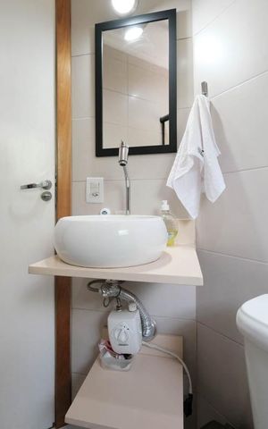 Casa de condomínio à venda com 83m², 2 quartos e 2 vagasBanheiro