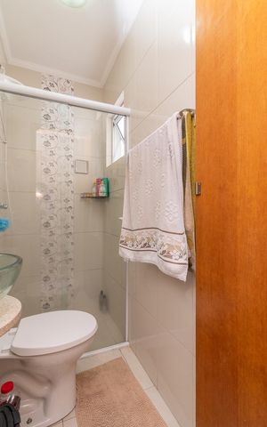Casa à venda com 100m², 2 quartos e 3 vagasBanheiro da Suíte 1