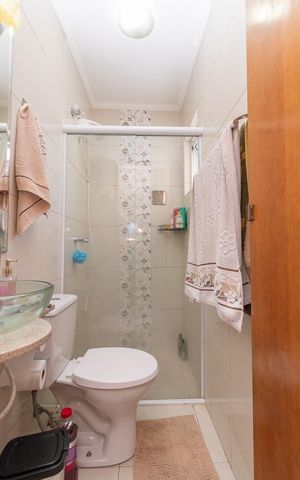 Casa à venda com 100m², 2 quartos e 3 vagasBanheiro da Suíte 1