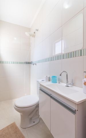 Casa à venda com 100m², 2 quartos e 3 vagasBanheiro da Suíte 2