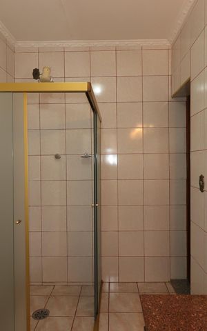 Casa à venda com 400m², 3 quartos e 4 vagasBanheiro da Suíte 1