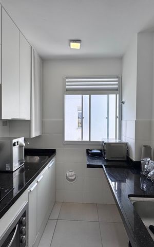 Apartamento para alugar com 50m², 2 quartos e 1 vaga Apartamento para alugar com 50m², 2 quartos e 1 vagaCozinha e Área de Serviço