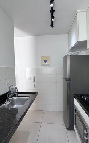 Apartamento para alugar com 50m², 2 quartos e 1 vaga Apartamento para alugar com 50m², 2 quartos e 1 vagaCozinha e Área de Serviço
