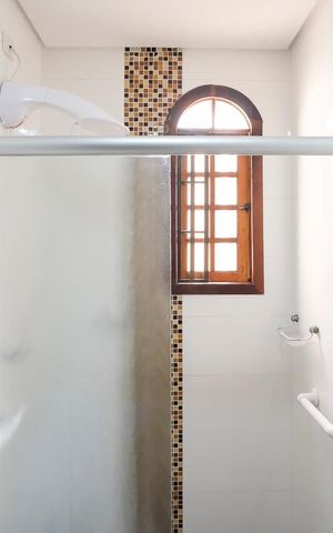Casa à venda com 295m², 4 quartos e 3 vagasBanheiro da suíte