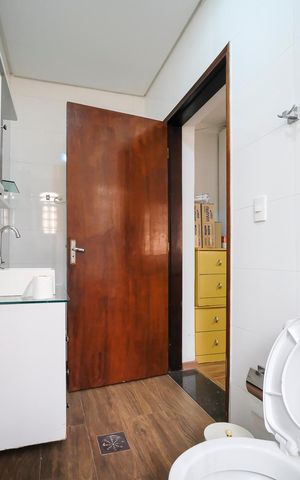 Casa à venda com 295m², 4 quartos e 3 vagasBanheiro da suíte