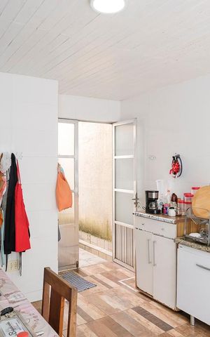 Casa à venda com 295m², 4 quartos e 3 vagasCozinha e área de serviço