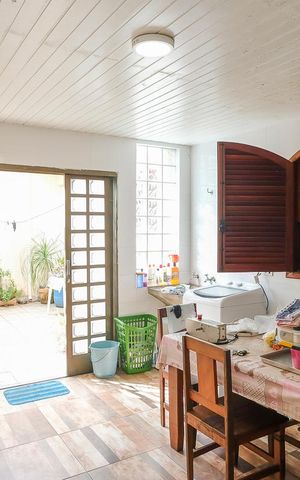 Casa à venda com 295m², 4 quartos e 3 vagasCozinha e área de serviço