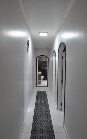 Casa à venda com 234m², 4 quartos e 2 vagasCorredor