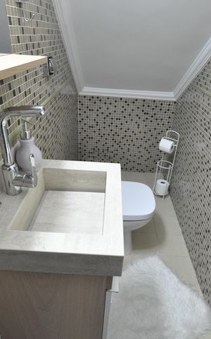 Casa à venda com 234m², 4 quartos e 2 vagasLavabo
