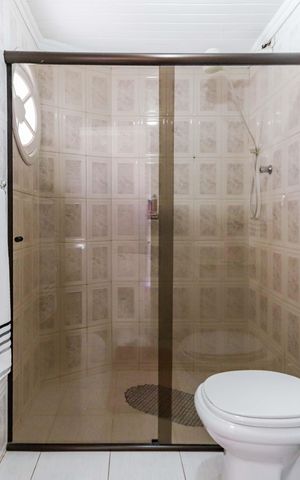 Casa de condomínio à venda com 350m², 4 quartos e 4 vagas Casa de condomínio à venda com 350m², 4 quartos e 4 vagasSuíte 02
