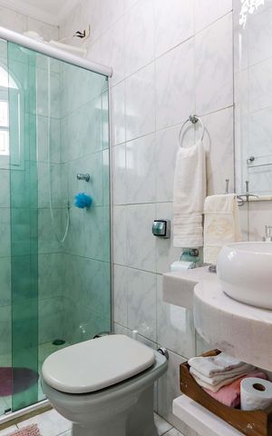 Casa de condomínio à venda com 350m², 4 quartos e 4 vagas Casa de condomínio à venda com 350m², 4 quartos e 4 vagasSuíte 04