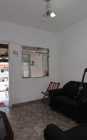 Casa à venda com 129m², 2 quartos e 2 vagasSala