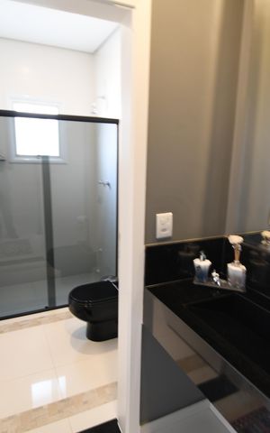 Casa de condomínio à venda com 410m², 4 quartos e 2 vagasBanheiro