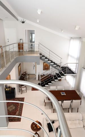 Casa de condomínio à venda com 410m², 4 quartos e 2 vagasMezanino