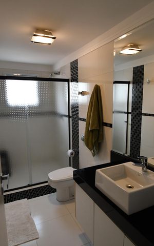 Casa de condomínio à venda com 410m², 4 quartos e 2 vagasBanheiro Suíte