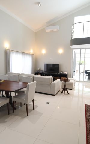 Casa de condomínio à venda com 410m², 4 quartos e 2 vagasSala