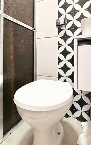 Casa de condomínio à venda com 90m², 2 quartos e 2 vagas Casa de condomínio à venda com 90m², 2 quartos e 2 vagasBanheiro de serviço